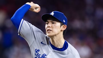 May 9, 2025; Phoenix, Arizona, USA; Los Angeles Dodgers pitcher Roki Sasaki (11) against the Arizona Diamondbacks at Chase Field. Mandatory Credit: Mark J. Rebilas-Imagn Images