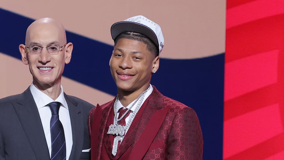 Jun 25, 2025; Brooklyn, NY, USA; Jeremiah Fears stands with NBA commissioner Adam Silver after being selected as the seventh pick by the New Orleans Pelicans in the first round of the 2025 NBA Draft at Barclays Center. Mandatory Credit: Brad Penner-Imagn Images Jun 25, 2025; Brooklyn, NY, USA; Jeremiah Fears stands with NBA commissioner Adam Silver after being selected as the seventh pick by the New Orleans Pelicans in the first round of the 2025 NBA Draft at Barclays Center. Mandatory Credit: Brad Penner-Imagn Images