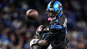 Detroit Lions wide receiver Jameson Williams (1) misses a pass intended for him against Tampa Bay Buccaneers safety Tykee Smith (23) during the second half at Ford Field in Detroit on Monday, Oct. 20, 2025.