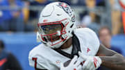 Oct 25, 2025; Pittsburgh, Pennsylvania, USA; North Carolina State Wolfpack tight end Justin Joly (7) catches the ball for a touchdown against the Pittsburgh Panthers during the first quarter at Acrisure Stadium. Mandatory Credit: Charles LeClaire-Imagn Images