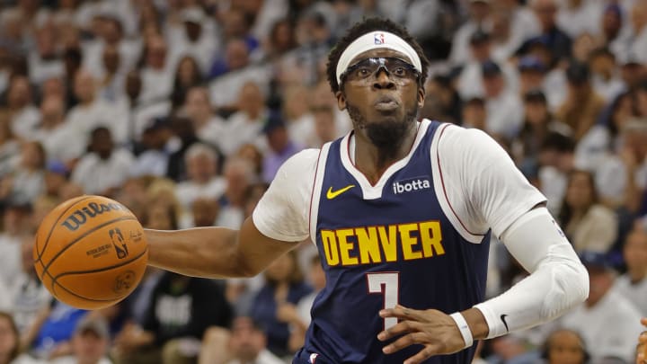 May 12, 2024; Minneapolis, Minnesota, USA; Denver Nuggets guard Reggie Jackson (7) goes to the basket against the Minnesota Timberwolves in the first quarter of game four of the second round for the 2024 NBA playoffs at Target Center. Mandatory Credit: Bruce Kluckhohn-USA TODAY Sports