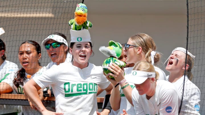Oregon players hold rally Ducks during the NCAA Norman Regional tournament softball final between the Oklahoma Sooners and the Oregon Ducks at Love's Field in Norman, Okla. Sunday, May, 19, 2024.