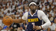 May 12, 2024; Minneapolis, Minnesota, USA; Denver Nuggets guard Reggie Jackson (7) goes to the basket against the Minnesota Timberwolves in the first quarter of game four of the second round for the 2024 NBA playoffs at Target Center. Mandatory Credit: Bruce Kluckhohn-USA TODAY Sports