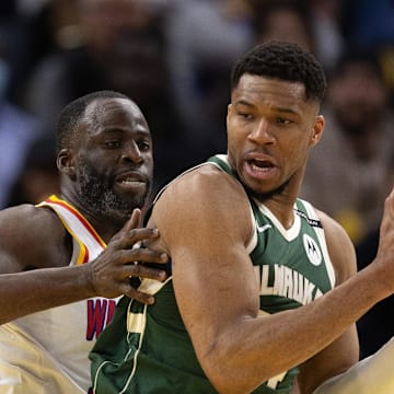 Draymond Green guarding Giannis Antetokounmpo, the only player in the league the Warriors would give him up for.