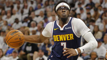 May 12, 2024; Minneapolis, Minnesota, USA; Denver Nuggets guard Reggie Jackson (7) goes to the basket against the Minnesota Timberwolves in the first quarter of game four of the second round for the 2024 NBA playoffs at Target Center. Mandatory Credit: Bruce Kluckhohn-USA TODAY Sports