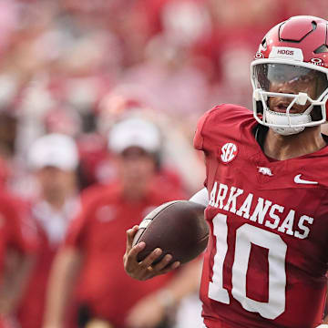 Arkansas Razorbacks quarterback Taylen Green (10) rushes during the first quarter against the UAPB Golden Lions at War Memorial Stadium.