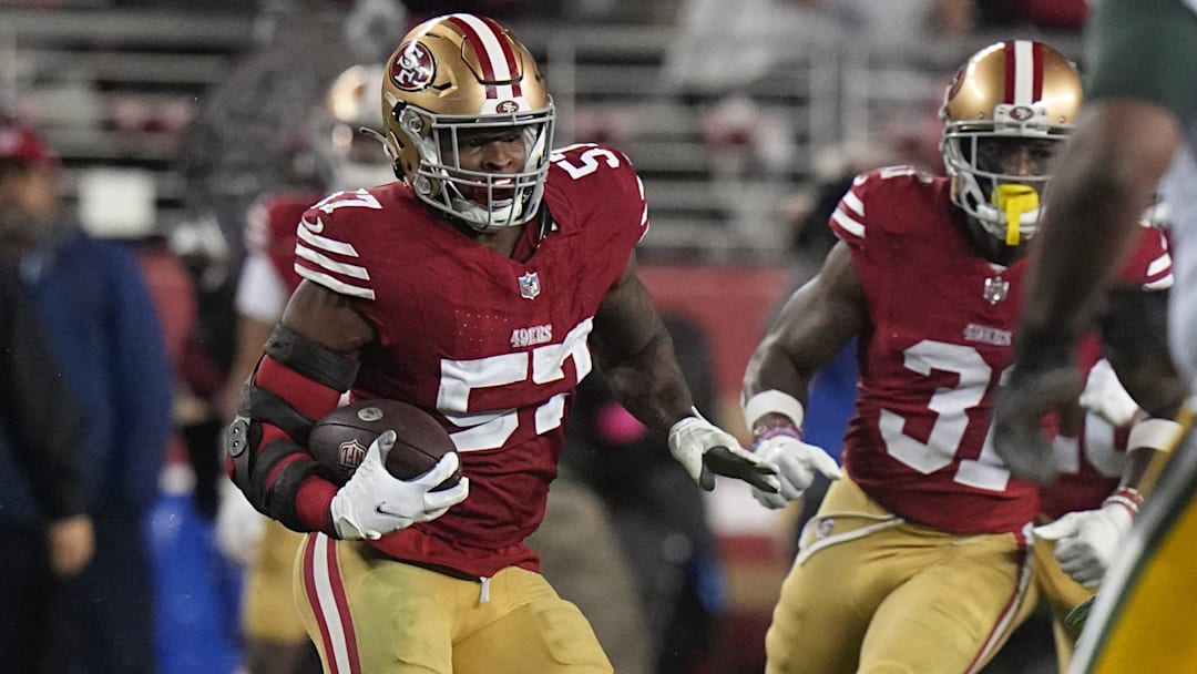 San Francisco 49ers linebacker Dre Greenlaw (57) intercepts a pass during the third quarter of their NFC divisional playoff game Saturday, January 20, 2024 at Levi    Stadium in Santa Clara, California. The San Francisco 49ers beat the Green Bay Packers 24-21.
