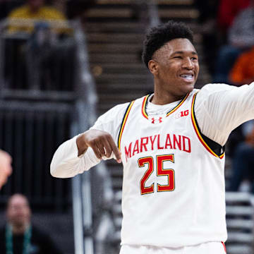 Maryland Terrapins center Derik Queen (25) celebrates a made basket in the second half against the Michigan Wolverines at Gainbridge Fieldhouse.