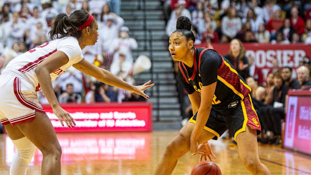 USC's JuJu Watkins (12) works against Indiana's Chloe Moore-McNeil (22) during.