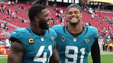 Sep 28, 2025; Santa Clara, California, USA; Jacksonville Jaguars defensive end Josh Hines-Allen (41) and defensive tackle Arik Armstead (91) after the game against the San Francisco 49ers at Levi's Stadium. Mandatory Credit: Darren Yamashita-Imagn Images