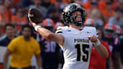 Purdue Boilermakers quarterback Ryan Browne (15) passes 