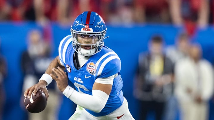 Jan 8, 2026; Glendale, AZ, USA; Mississippi Rebels quarterback Trinidad Chambliss (6) against the Miami Hurricanes during the 2026 Fiesta Bowl and semifinal game of the College Football Playoff at State Farm Stadium. Mandatory Credit: Mark J. Rebilas-Imagn Images