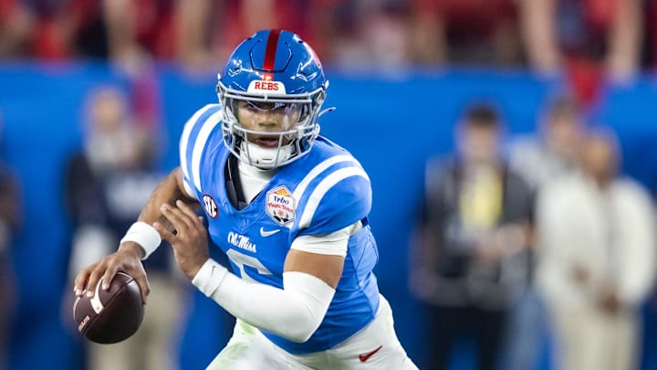 Jan 8, 2026; Glendale, AZ, USA; Mississippi Rebels quarterback Trinidad Chambliss (6) against the Miami Hurricanes during the 2026 Fiesta Bowl and semifinal game of the College Football Playoff at State Farm Stadium. Mandatory Credit: Mark J. Rebilas-Imagn Images