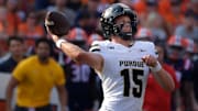 Purdue Boilermakers quarterback Ryan Browne (15) passes 