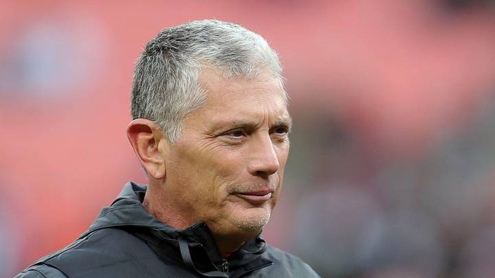 Former Cleveland Browns defensive coordinator Jim Schwartz watches the team 