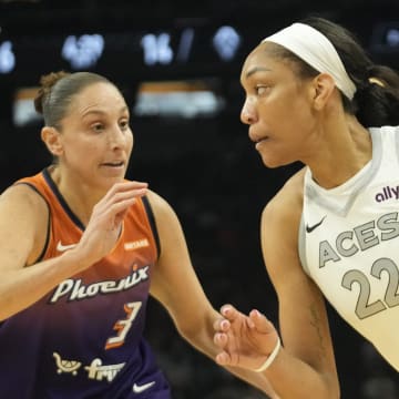 Phoenix Mercury guard Diana Taurasi (3) defends against Las Vegas Aces center A'ja Wilson (22) during the first quarter at Footprint Center on Sept. 1, 2024, in Phoenix.