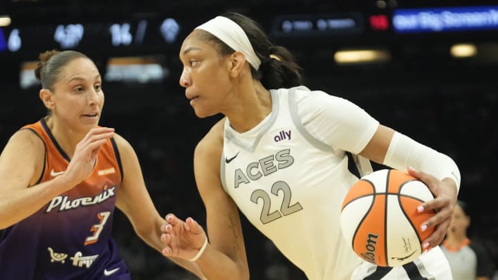 Phoenix Mercury guard Diana Taurasi (3) defends against Las Vegas Aces center A'ja Wilson (22) during the first quarter at Footprint Center on Sept. 1, 2024, in Phoenix.