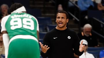 Oct 8, 2025; Memphis, Tennessee, USA; Boston Celtics head coach Joe Mazzulla reacts toward forward Chris Boucher (99) during the third quarter against the Memphis Grizzlies at FedExForum. Mandatory Credit: Petre Thomas-Imagn Images
