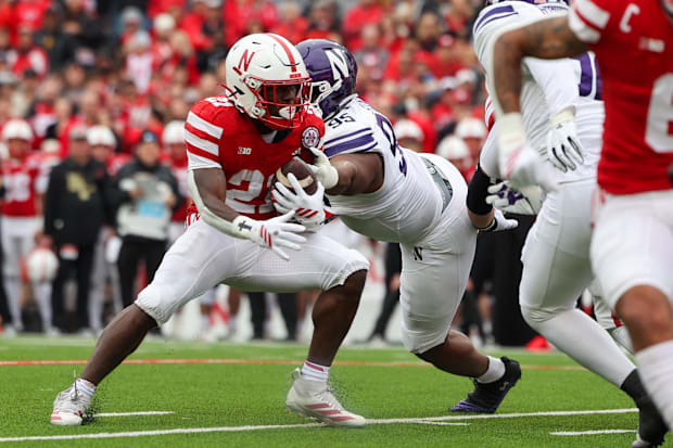 Emmett Johnson runs the ball against Northwestern.