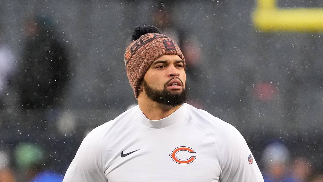 Jan 18, 2026; Chicago, IL, USA; Chicago Bears quarterback Caleb Williams (18) looks on during warmups before an NFC Divisional Round game against the Los Angeles Rams at Soldier Field. Mandatory Credit: David Banks-Imagn Images