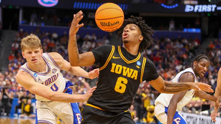 Thomas Haugh and  Iowa guard Tavion Banks 