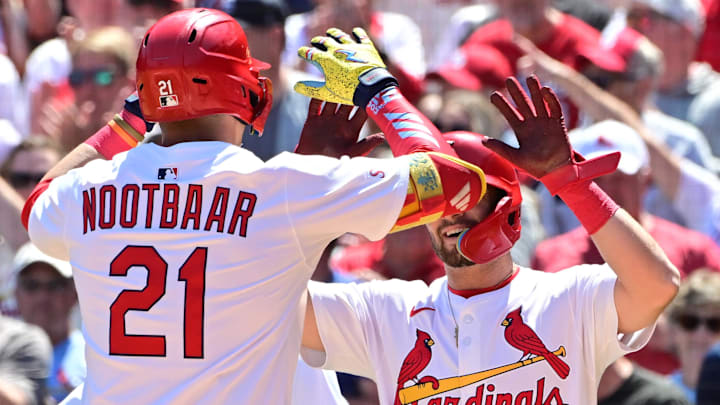 Apr 16, 2025; St. Louis, MO St. Louis Cardinals outfielder Lars Nootbaar (21) is congratulated by St. Louis Cardinals second baseman Thomas Saggese (25) after Nootbar hit a three-run home run in the fifth inning against the Houston Astros at Busch Stadium. Mandatory Credit: Tim Vizer-Imagn Images