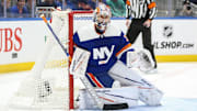 Feb 24, 2024; Elmont, New York, USA;  New York Islanders goaltender Ilya Sorokin (30) defends the net in the first period against the Tampa Bay Lightning at UBS Arena. Mandatory Credit: Wendell Cruz-Imagn Images