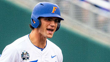 Jac Caglianone (14) reacts after hitting a double against the Kentucky Wildcats during the first inning at Charles Schwab Field Omaha. 