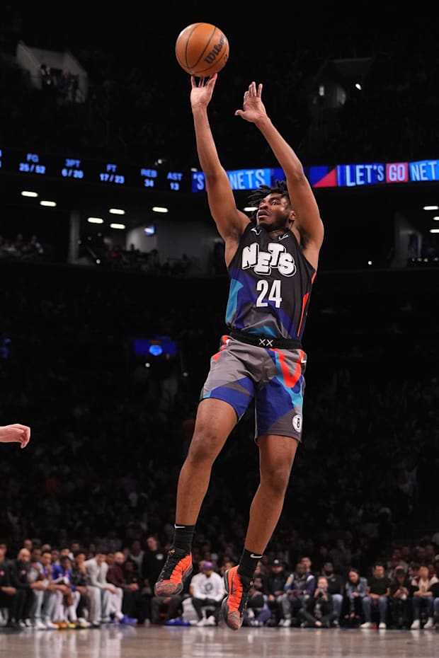 Brooklyn Nets shooting guard Cam Thomas (24) shoots a three-point jump shot against the Detroit Pistons in 2023-24.