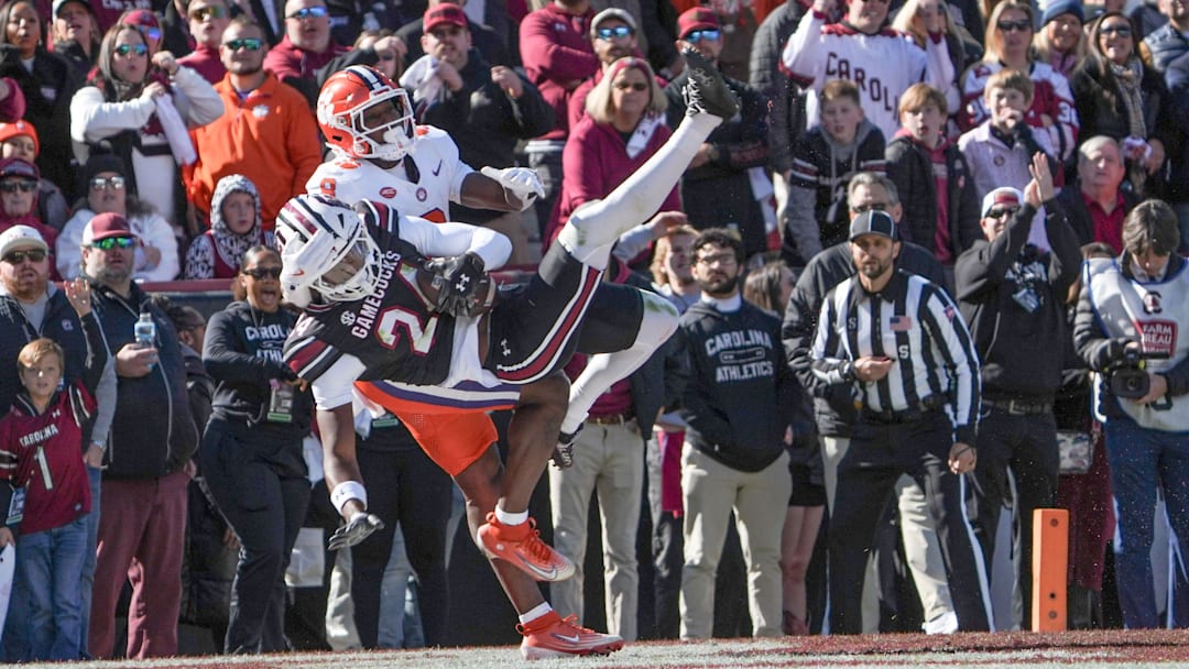 South Carolina defensive back Jalon Kilgore (24) intercepts a pass meant for Clemson running back Adam Randall (8) during the first quarter at Williams-Brice Stadium in Columbia, S.C. Saturday, November 29, 2025.