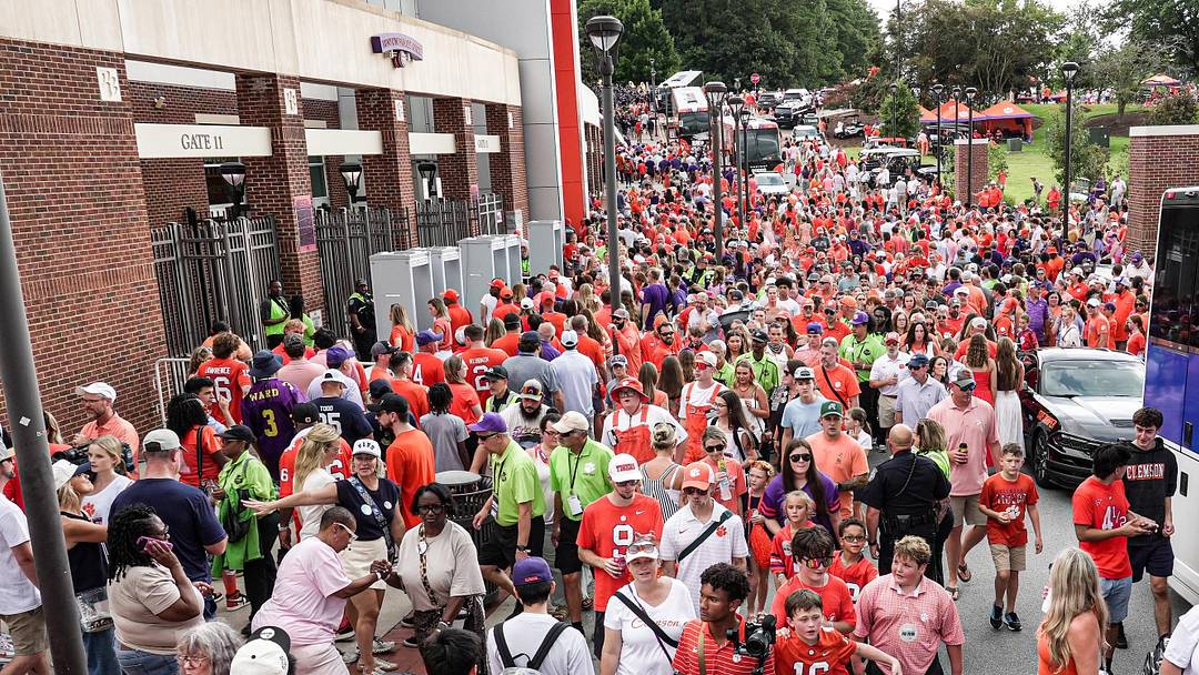 Fans walk to the stadium after Tiger Walk before the game at Memorial Stadium in Clemson, S.C.. Fans walk to the stadium after Tiger Walk before the game at Memorial Stadium in Clemson, S.C..