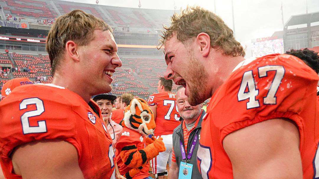 Clemson quarterback Tait Reynolds (2) and linebacker Sammy Brown (47) celebrate beating North Carolina Clemson quarterback Tait Reynolds (2) and linebacker Sammy Brown (47) celebrate beating North Carolina