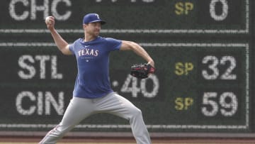 May 24, 2023; Pittsburgh, Pennsylvania, USA; Texas Rangers pitcher Jacob deGrom (48) throws in the outfield before the game against the Pittsburgh Pirates at PNC Park. Mandatory Credit: Charles LeClaire-USA TODAY Sports