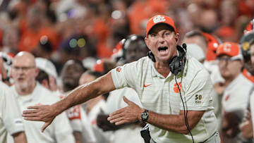 Clemson head coach Dabo Swinney communicates with a referee in the game with Louisiana State University during the second quarter at Memorial Stadium in Clemson, S.C. Saturday, Aug 30, 2025.
