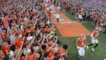 Clemson football players run down the hill before the game with Clemson and Louisiana State University at Memorial Stadium in Clemson, S.C. Saturday, August 30, 2025.