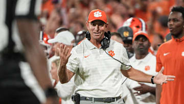 Clemson head coach Dabo Swinney communicates with a referee in the game with Louisiana State University during the second quarter at Memorial Stadium in Clemson, S.C. Saturday, Aug 30, 2025.