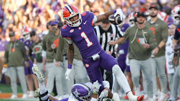Clemson wide receiver T.J. Moore (1) runs after a catch against Furman during the first quarter at Memorial Stadium in Clemson, S.C. Saturday, November 22, 2025.