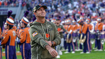 Clemson head coach Dabo Swinney watches as seniors walk down the hill before kickoff with Furman University at Memorial Stadium in Clemson, SC, Saturday, November 22, 2025.