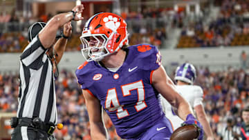 Clemson linebacker Sammy Brown (47) reacts after intercepting a pass against Furman during the second quarter at Memorial Stadium in Clemson, S.C. Saturday, November 22, 2025.
