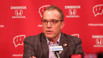 Feb 20, 2022; Madison, Wisconsin, USA; Wisconsin Badgers athletic director Chris McIntosh addresses the media about the altercation with the Michigan Wolverines team during the post-game media conference at the Kohl Center. Mandatory Credit: Mary Langenfeld-Imagn Images