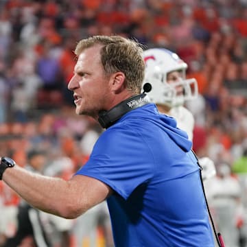 SMU coach Rhett Lashlee speaks to offensive lineman Savion Byrd