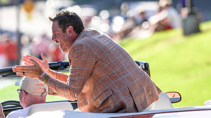 Shawn Poppie, women’s basketball head coach and parade Grand Marshal waves during First Friday Parade in Clemson, SC August 29, 2025. Tiger fans are invited to join in the festivities and celebrate this year’s theme of “Eye of the Tiger, Heart of the Champion.”