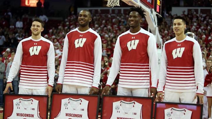 Mar 5, 2017; Madison, WI, USA; The four graduating seniors (from left) Wisconsin Badgers guard Zak Showalter (3), forward Vitto Brown (30), forward Nigel Hayes (10) and guard Bronson Koenig (24) were honored for their contributions to the program before the game with the Minnesota Gophers at the Kohl Center. Wisconsin defeated Minnesota 66-49. Mar 5, 2017; Madison, WI, USA; The four graduating seniors (from left) Wisconsin Badgers guard Zak Showalter (3), forward Vitto Brown (30), forward Nigel Hayes (10) and guard Bronson Koenig (24) were honored for their contributions to the program before the game with the Minnesota Gophers at the Kohl Center. Wisconsin defeated Minnesota 66-49.
