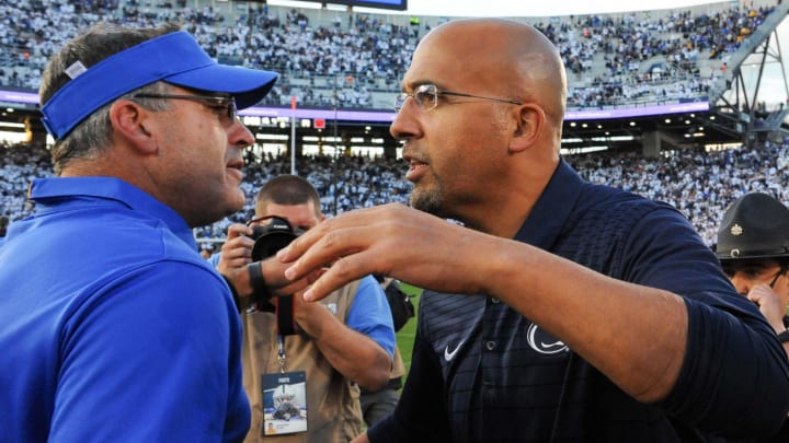 Pittsburgh Panthers head coach Pat Narduzzi and Penn State Nittany Lions head coach James Franklin meet on the field following a game at Beaver Stadium. 