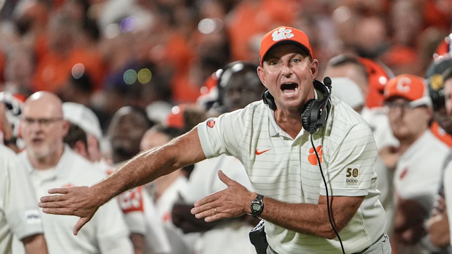 Clemson head coach Dabo Swinney communicates with a referee
