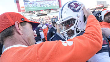 Clemson head coach Dabo Swinney talks with South Carolina running back Matt Fuller (28) after the Tigers’ 28-14 win at Williams-Brice Stadium in Columbia, S.C. Saturday, November 29, 2025.