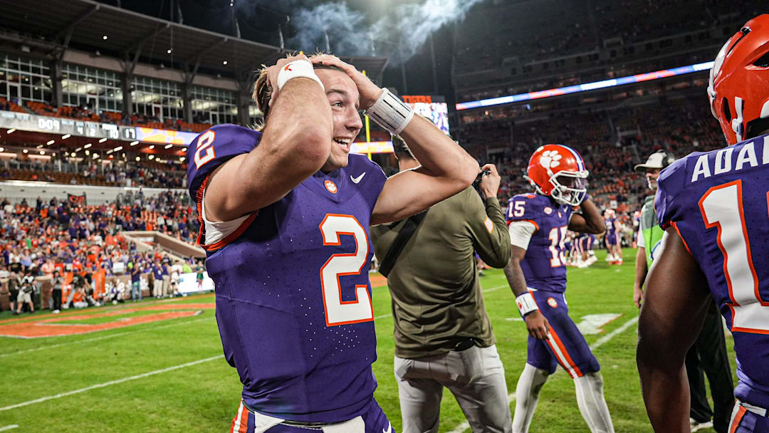 Clemson quarterback Cade Klubnik (2) reacts after quarterback Chris Denson (15) scored against Furman during the fourth quarter at Memorial Stadium in Clemson, S.C. Saturday, November 22, 2025.
