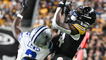 Oct 6, 2024; Pittsburgh, Pennsylvania, USA; Pittsburgh Steelers wide receiver George Pickens (14 )is unable to catch a pass while being defended by Dallas Cowboys cornerback Jourdan Lewis (2) during the second quarter at Acrisure Stadium. Mandatory Credit: Barry Reeger-Imagn Imag