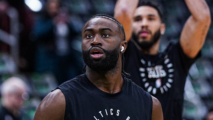 Boston Celtics forward Jayson Tatum (0) and guard Jaylen Brown (7) warm up before the start of the game against the Sacramento Kings at TD Garden. 