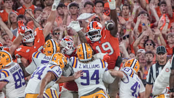 Clemson defensive lineman DeMonte Capehart (19) reaches attempting to block a field goal Louisiana State University kicker Damian Ramos (34) kicked wide during the third quarter at Memorial Stadium in Clemson, S.C. Saturday, August 30, 2025.